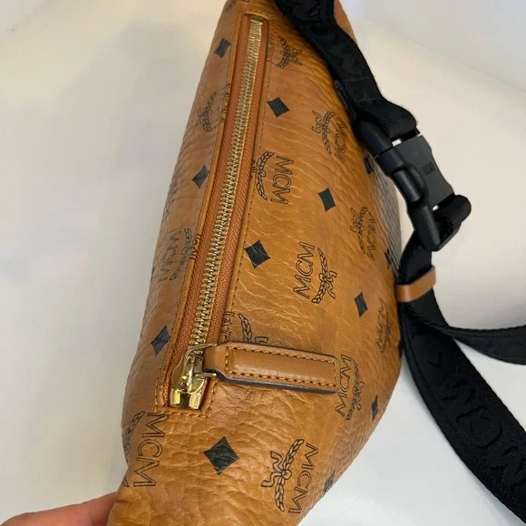 leather mcm bag and belt